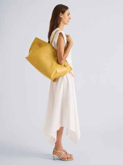 Proenza Schouler Image of model wearing Days Carryall in Paper Calf in Dijon