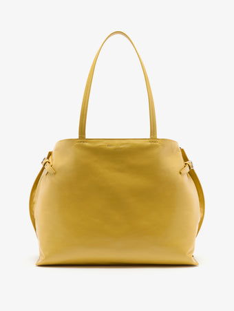 Proenza Schouler Front image of East West Chelsea Tote in Pebbled Calf in Soft White with strap extended