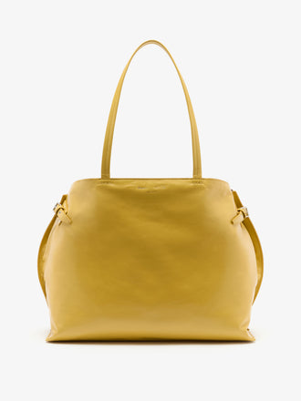 Proenza Schouler Front image of East West Chelsea Tote in Pebbled Calf in Soft White with strap extended