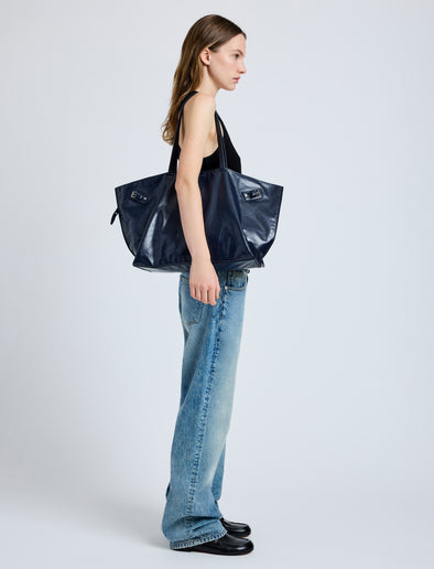 Image of model wearing Days Carryall in Paper Calf in Navy
