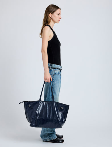 Image of model wearing Days Carryall in Paper Calf in Navy