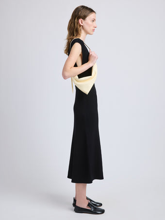 Image of model wearing Tetra Shoulder Bag in Nappa in Resin