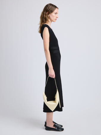 Image of model wearing Tetra Shoulder Bag in Nappa in Resin