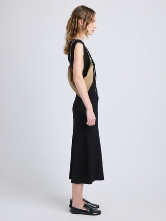 Image of model wearing Tetra Shoulder Bag in Nappa in Cumin