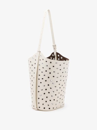 Proenza Schouler Side image of Brant Bucket Bag in Eyelet Covered Smooth Calf in Ecru