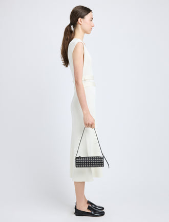 Image of model wearing Silo Bag in Eyelet Covered Nappa in Black