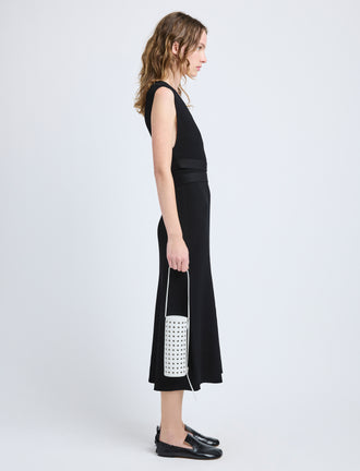 Image of model wearing Silo Bag in Eyelet Covered Nappa in Optic White