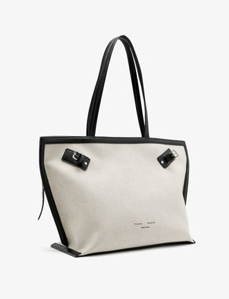 Proenza Schouler front 3/4 image of Days Carryall in Natural Linen in natural/black