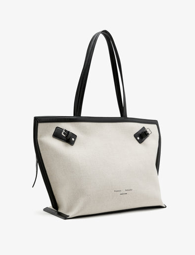 Proenza Schouler front 3/4 image of Days Carryall in Natural Linen in natural/black