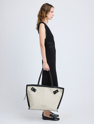 Proenza Schouler image of model carrying  Days Carryall in Natural Linen in natural/black