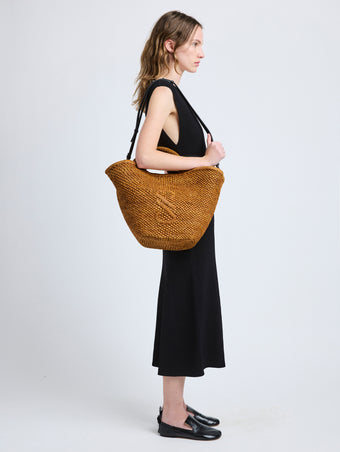 Image of model wearing Large Chelsea Tote in Natural Raffia in Honey