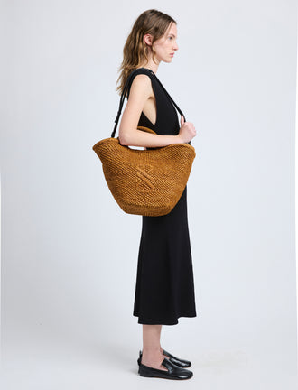 Image of model wearing Large Chelsea Tote in Natural Raffia in Honey