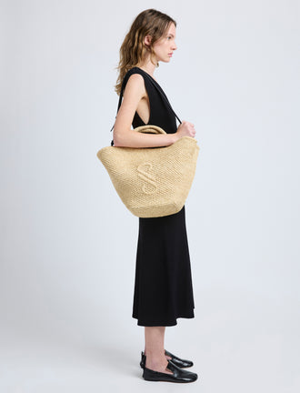 Image of model wearing Large Chelsea Tote in Natural Raffia in Natural