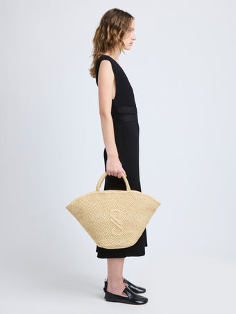 Image of model wearing Large Chelsea Tote in Natural Raffia in Natural
