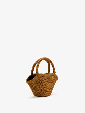 Side image of Small Chelsea Tote in Natural Raffia in Honey