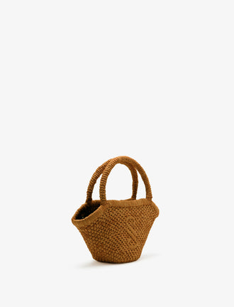 Side image of Small Chelsea Tote in Natural Raffia in Honey