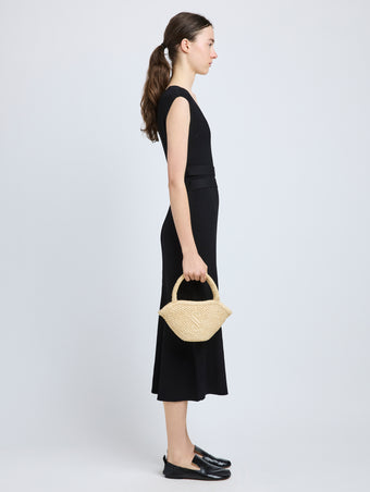 Image of model wearing Small Chelsea Tote in Natural Raffia in Natural