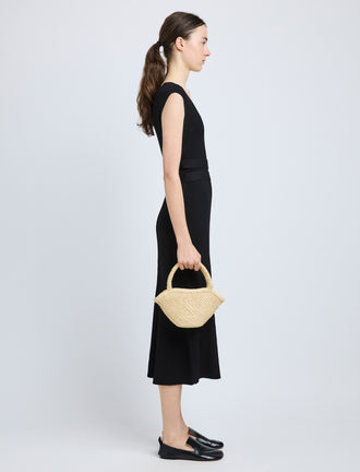 Image of model wearing Small Chelsea Tote in Natural Raffia in Natural