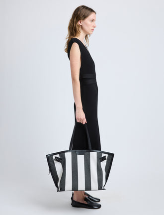 Proenza Schouler image of model carrying Days Carryall in Striped Canvas in black/white