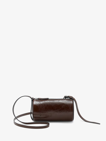 Proenza Schouler front image of Crossbody Silo Bag in Shiny Calf in cedar with strap folded down