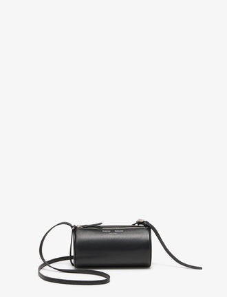 Proenza Schouler Front image of Crossbody Silo Bag in Black with strap folded down