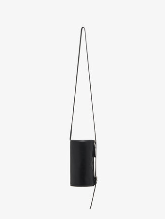 Front image of Crossbody Silo Bag in Black carried vertically