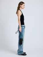Image of model wearing Crossbody Silo Bag in Black