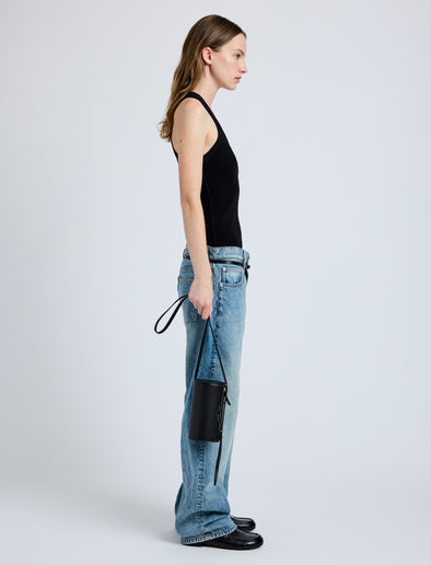 Image of model wearing Crossbody Silo Bag in Black