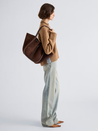 Proenza Schouler Image of model wearing Large Ruched Tote in Soft Suede in Chocolate