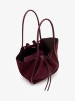 Proenza Schouler Aerial Still Life image of Large Ruched Tote in Soft Suede in Oxblood