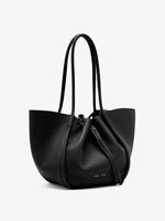 Proenza Schouler 3/4 image of Large Ruched Tote in Soft Pebbled Calf in Black