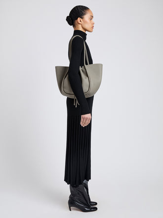 Image of model wearing Large Ruched Tote in Soft Pebbled Calf in Slate
