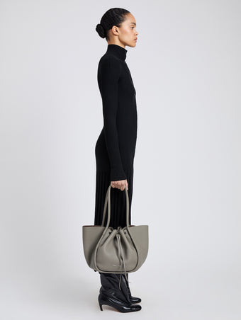 Image of model wearing Large Ruched Tote in Soft Pebbled Calf in Slate