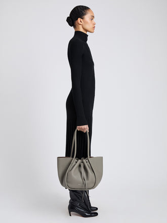 Image of model wearing Large Ruched Tote in Soft Pebbled Calf in Slate