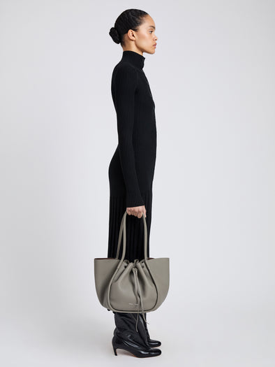 Image of model wearing Large Ruched Tote in Soft Pebbled Calf in Slate