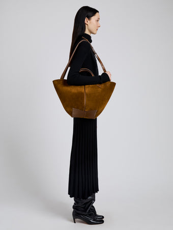Image of model wearing Large Chelsea Tote in Soft Suede in Fern