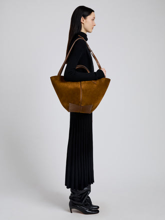 Image of model wearing Large Chelsea Tote in Soft Suede in Fern
