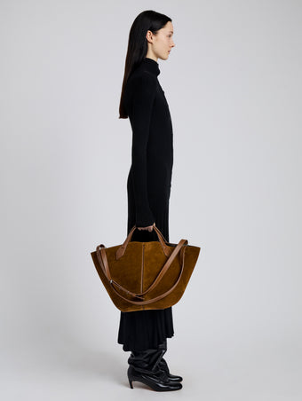 Image of model wearing Large Chelsea Tote in Soft Suede in Fern