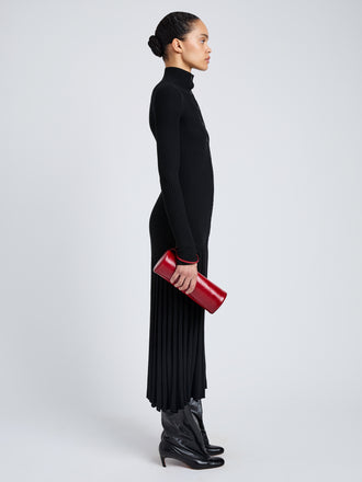 Proenza Schouler Image of model wearing Silo Clutch in Shiny Calf in Red