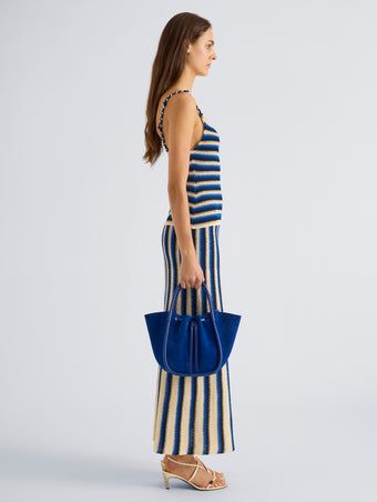 Proenza Schouler Image of model wearing Small Ruched Tote in Soft Suede in Cobalt