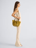 Proenza Schouler Image of model wearing Small Ruched Tote in Soft Suede in Dijon