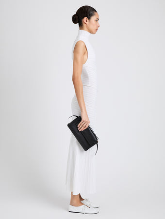 Proenza Schouler Image of model wearing Tate Clutch with Strap in Smooth Calf in Black