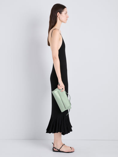 Proenza Schouler Image of model wearing Tate Clutch with Strap in Smooth Calf in Stone Blue