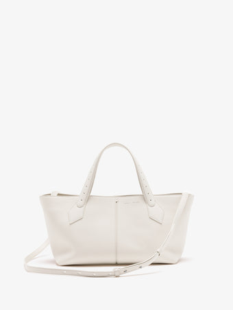 Proenza Schouler Front image of East West Chelsea Tote in Pebbled Calf in Soft White with strap extended