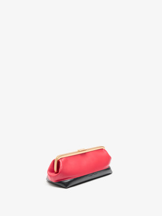 Proenza Schouler 3/4 image of Armory Clutch in Striped Nappa Plonge in TomatoBlack