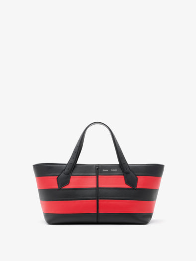 Proenza Schouler Image of model wearing East West Chelsea Tote in Striped Nappa Plonge in TomatoBlack