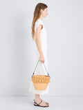 Proenza Schouler Image of model wearing Bucket bag in Raffia in Sand