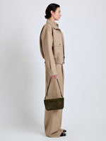 Proenza Schouler Image of model wearing Bond Bag in Perforated Suede in Olive