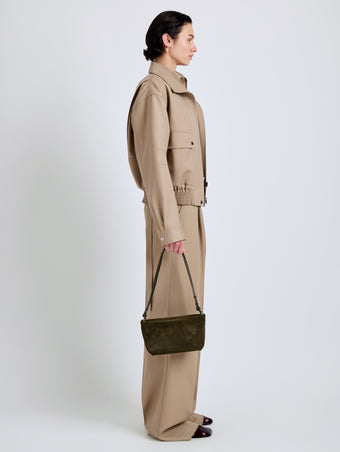 Proenza Schouler Image of model wearing Bond Bag in Perforated Suede in Olive