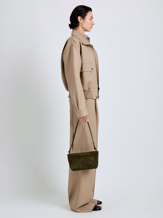 Proenza Schouler Image of model wearing Bond Bag in Perforated Suede in Olive